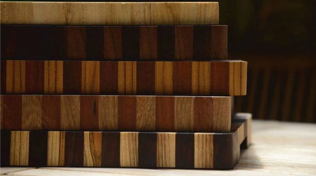 A finished batch of butcher blocks stacked and ready