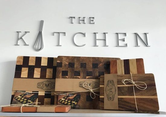 Búho GT boards displayed for sale on a shelf at The Kitchen