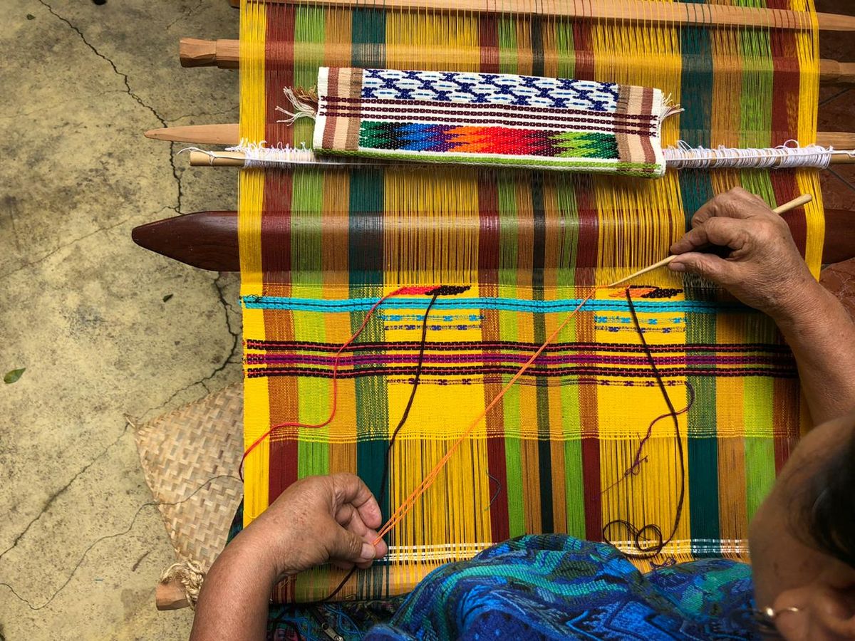 A weaving in progress on the backstrap loom